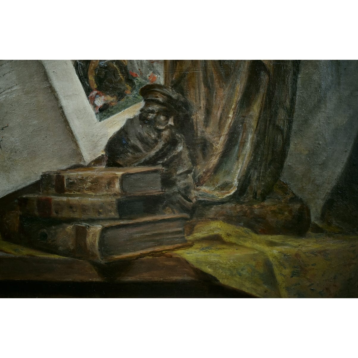 Still life with Saint Catherine statue, books, and manuscript by Adolphe-Jules Pouessel, for sale at Winckelmann Gallery.