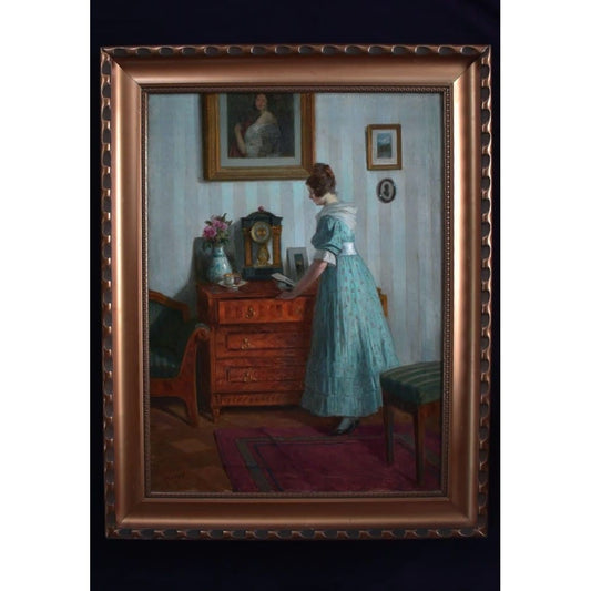 1923 oil painting by Robert Scheffer of woman in blue in Viennese interior, realist style, for sale at Winckelmann Gallery.