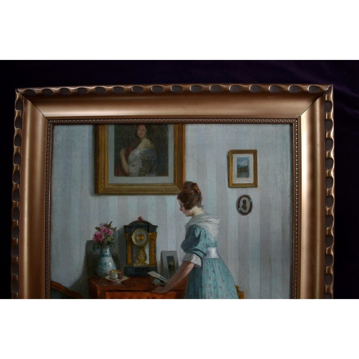 1923 oil painting by Robert Scheffer of woman in blue in Viennese interior, realist style, for sale at Winckelmann Gallery.
