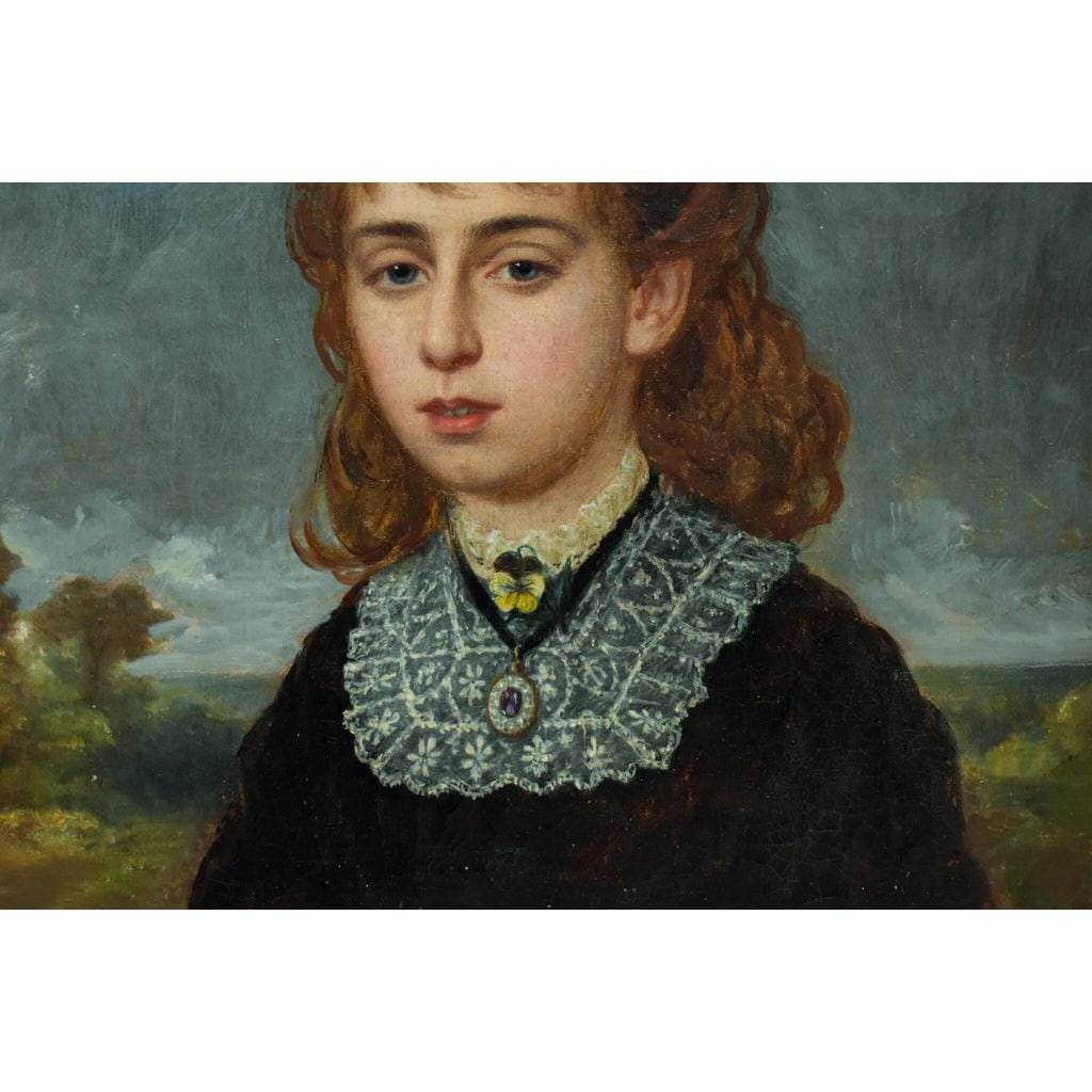 Detail view of white lace collar and jewelry Victorian girl
