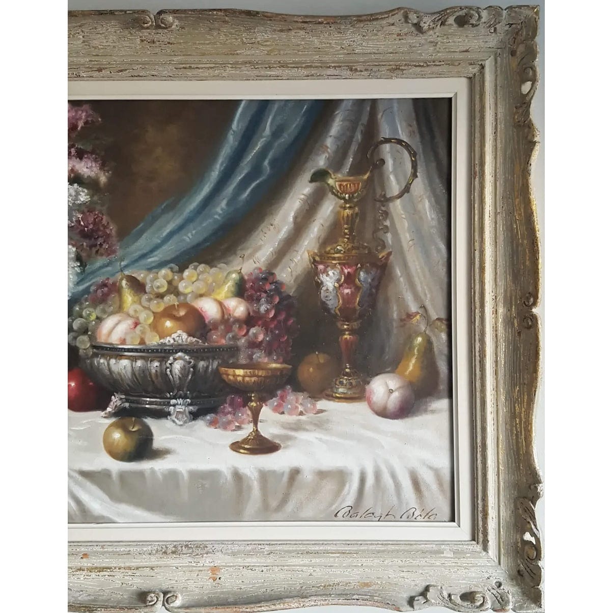 Still life painting by Béla Balogh with flowers, fruit, goblets – oil on canvas, circa 1950, in ornate white and gold carved frame