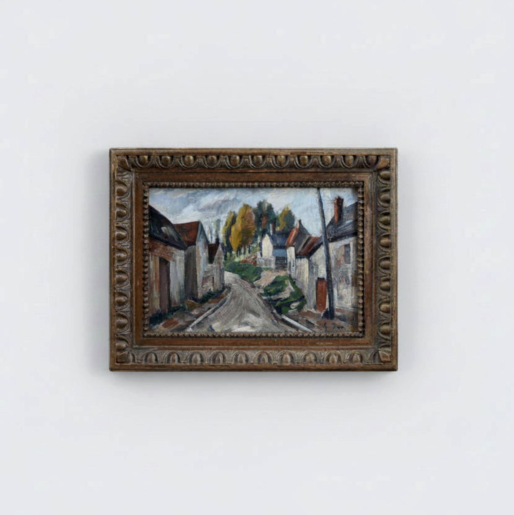 M. Davic French village with red-tiled roofs and autumnal trees