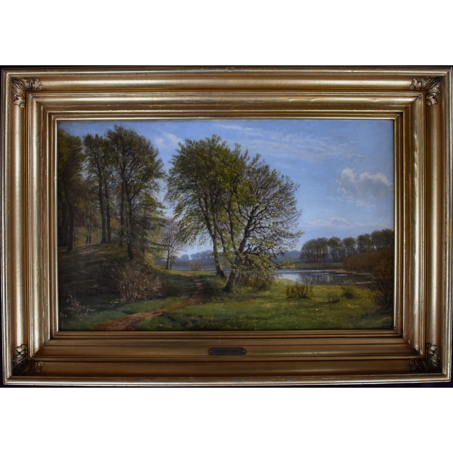 Late 19th century oil painting by Danish artist Godtfred Rump depicting a river landscape for sale at Winckelmann Gallery