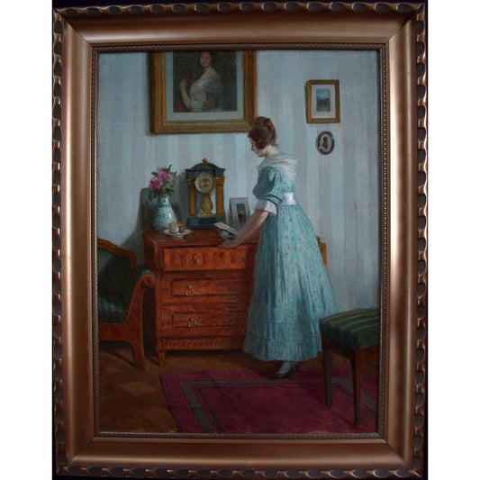 1923 oil painting by Robert Scheffer of woman in blue in Viennese interior, realist style, for sale at Winckelmann Gallery.
