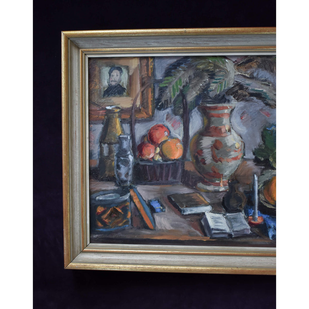 Still life oil painting by Spiros Xenos portrays a table with fruits, books and pottery for sale at Winckelmann Gallery