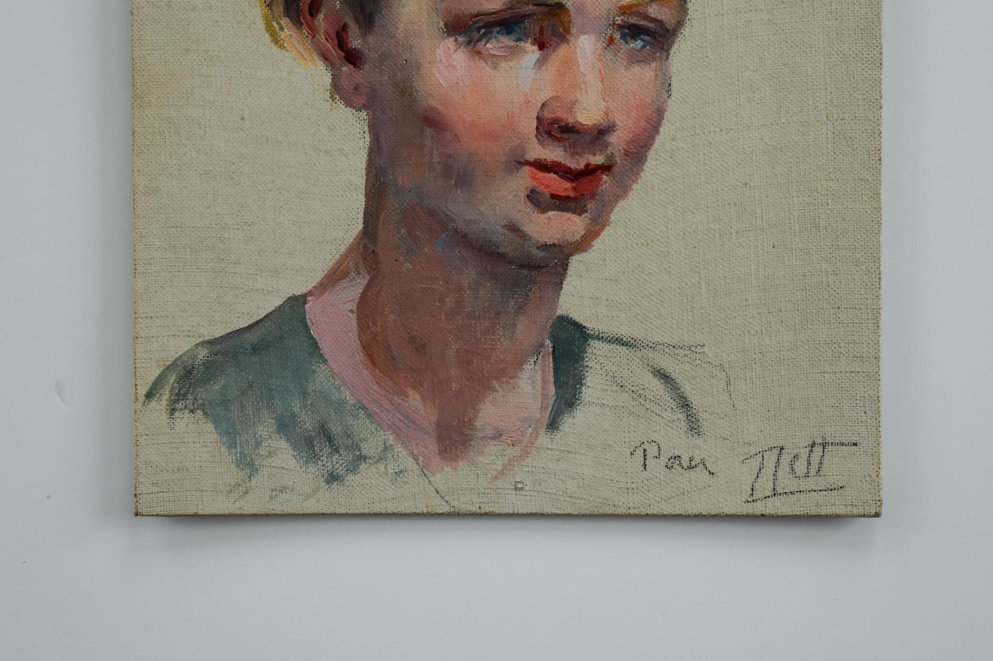 Vintage oil painting, portrait of a young woman with blue eyes circa 1940, by Odette Durand, for sale at Winckelmann Gallery